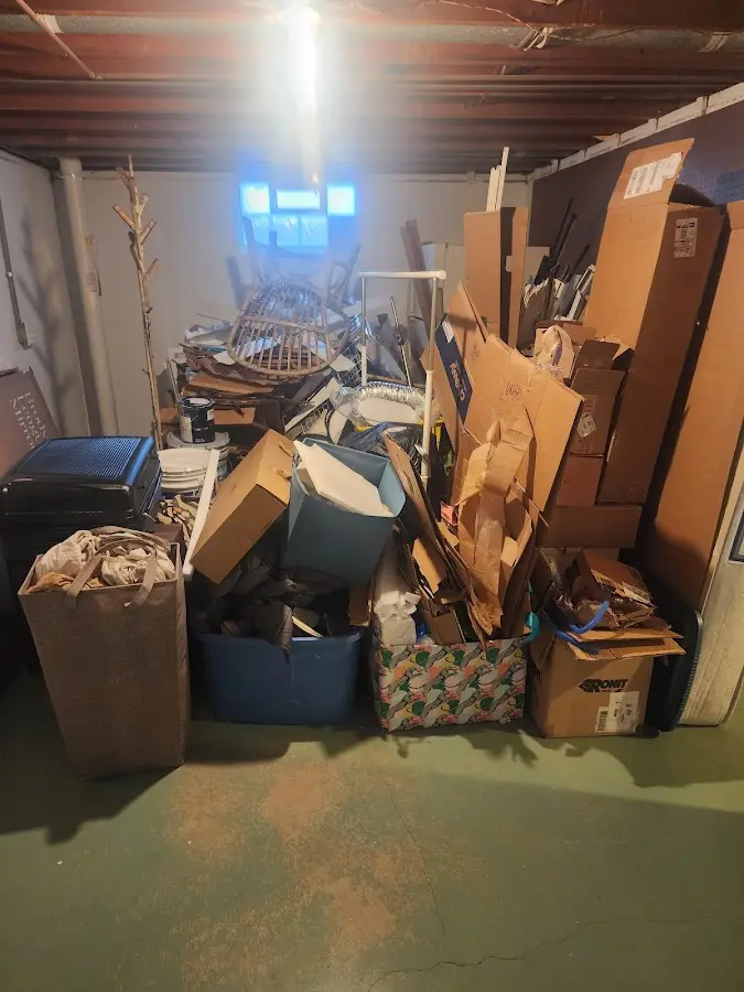 Roll-off dumpster container at job site for 2 Yard Dumpster Rental in Greensburg